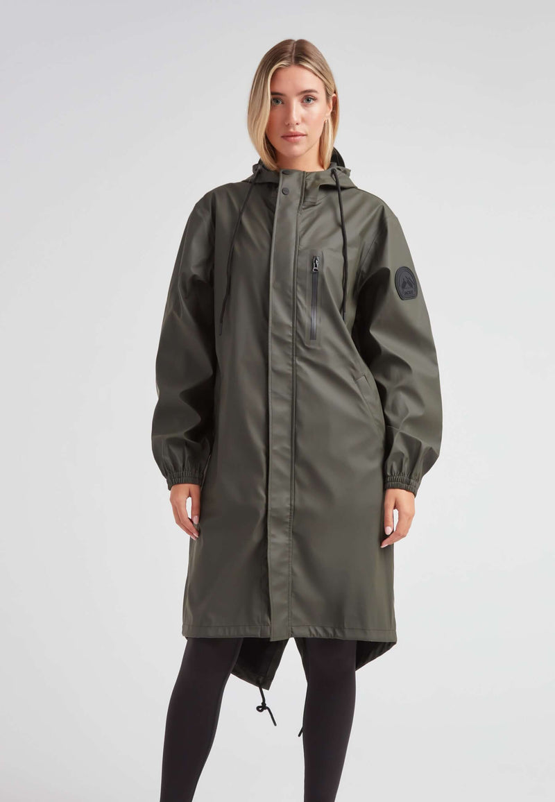 ELEMENTS unisex raincoat in khaki worn by a model, featuring a hood and zip pocket.