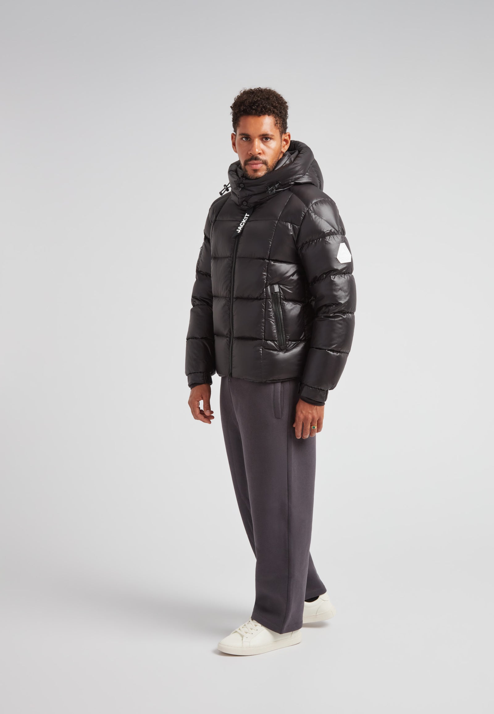 Model wearing EZ Boxed Puffer Racer Jacket Lux Black with structured style, perfect for urban cold-weather protection.