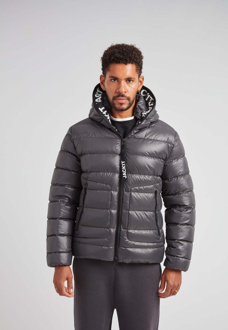 R4D Tramline Puffer Racer Jacket Lux Graphite worn by a model showcasing its sleek design and hood.