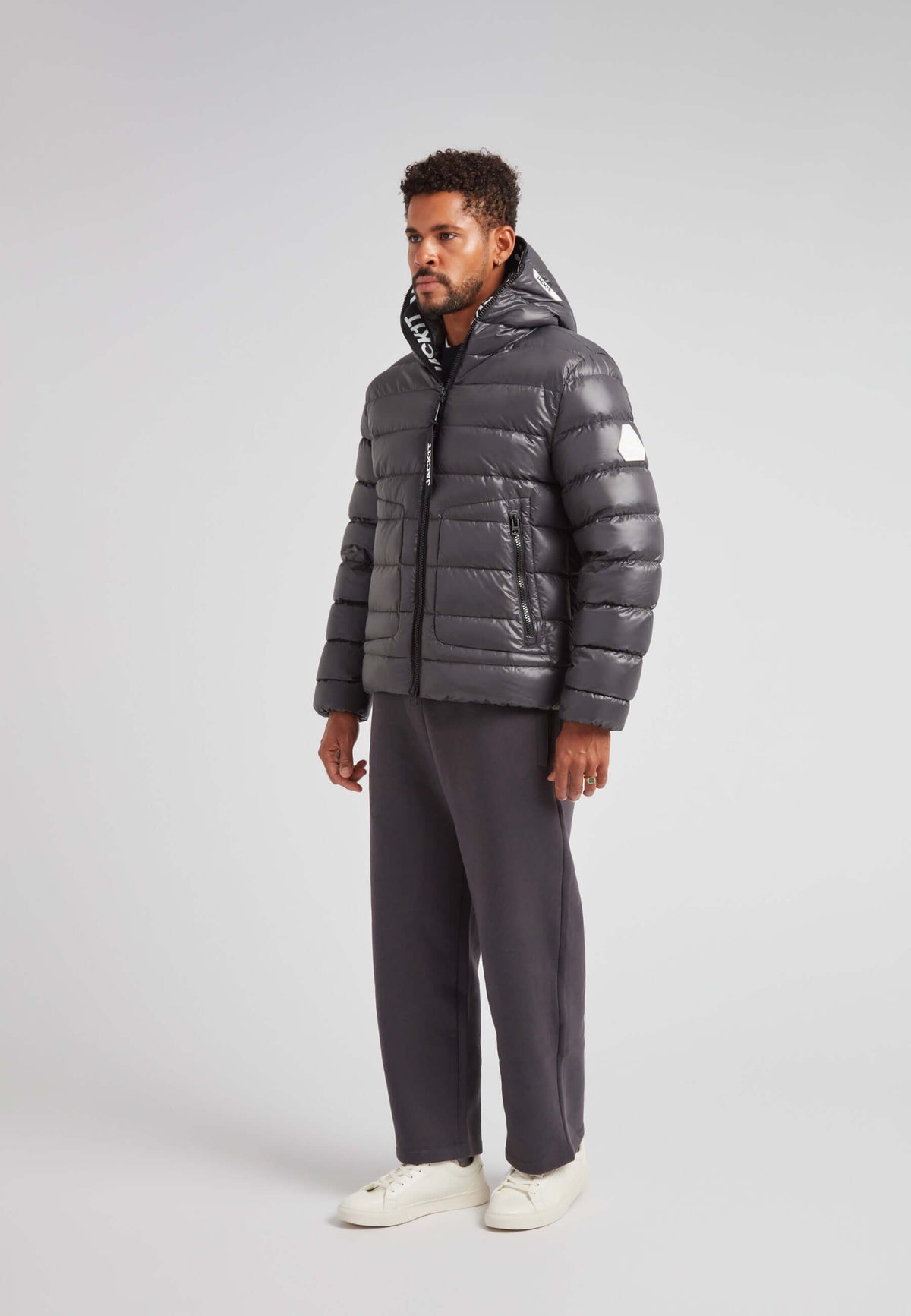 R4D Tramline Puffer Racer Jacket Lux Graphite on model in a modern, stylish pose.