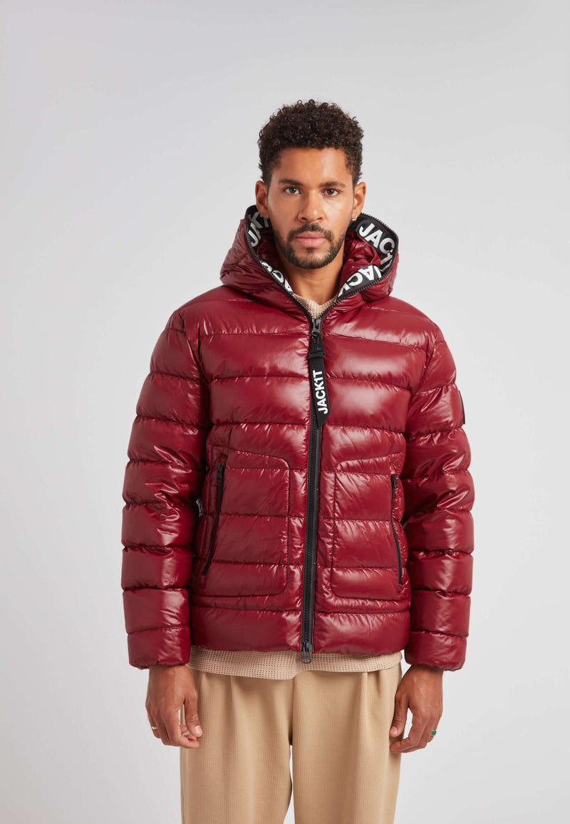 R4D Tramline Puffer Racer Jacket Lux Red worn by a model, showcasing its sleek design and vibrant red color.