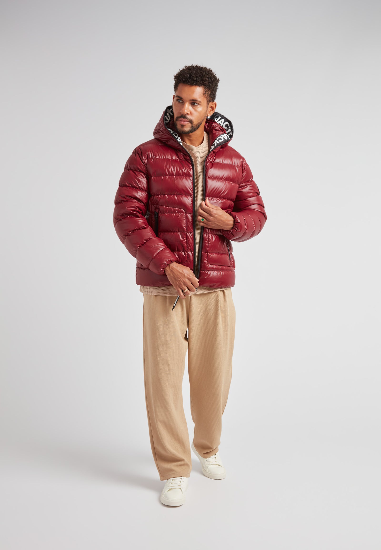 R4D Tramline Puffer Racer Jacket Lux Red showcased on a model in a stylish urban setting.