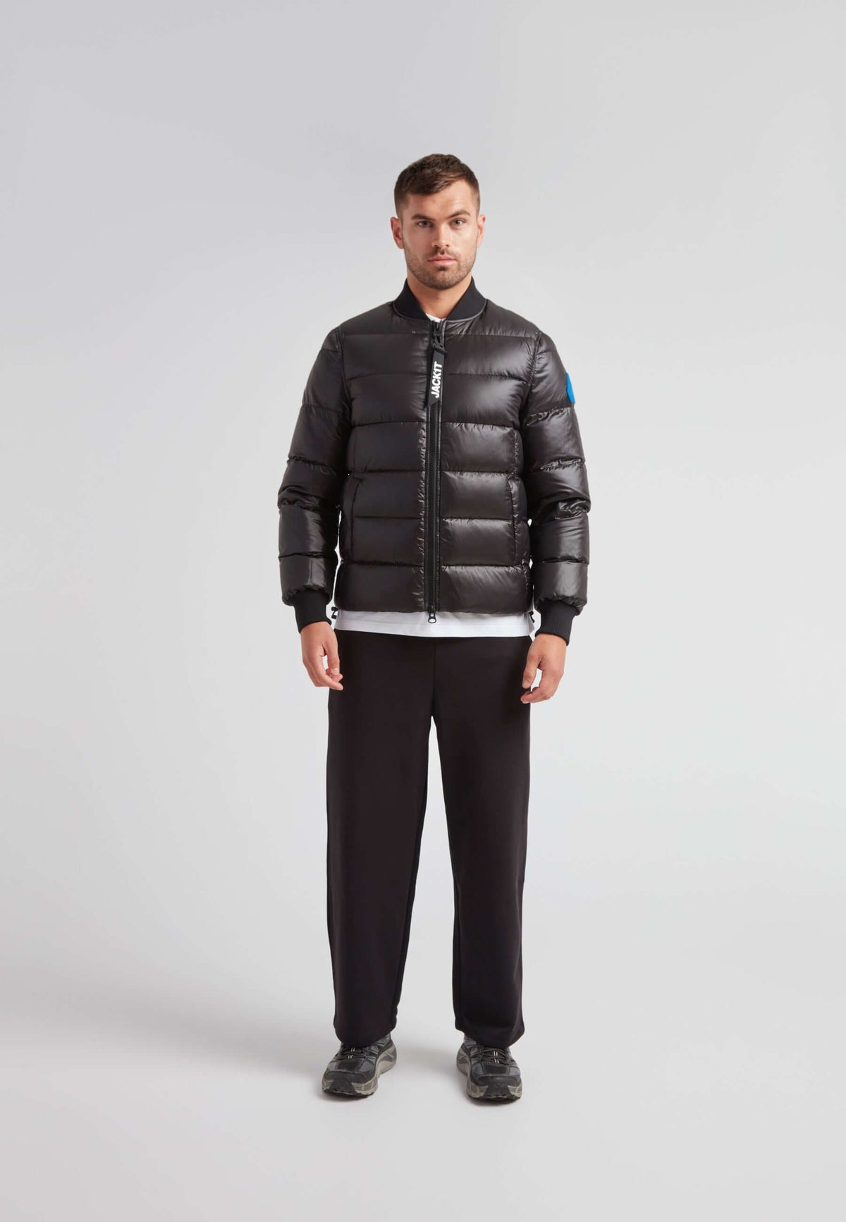 Vortex Black Bomber Jacket displayed on a model, featuring a durable nylon shell and modern design.