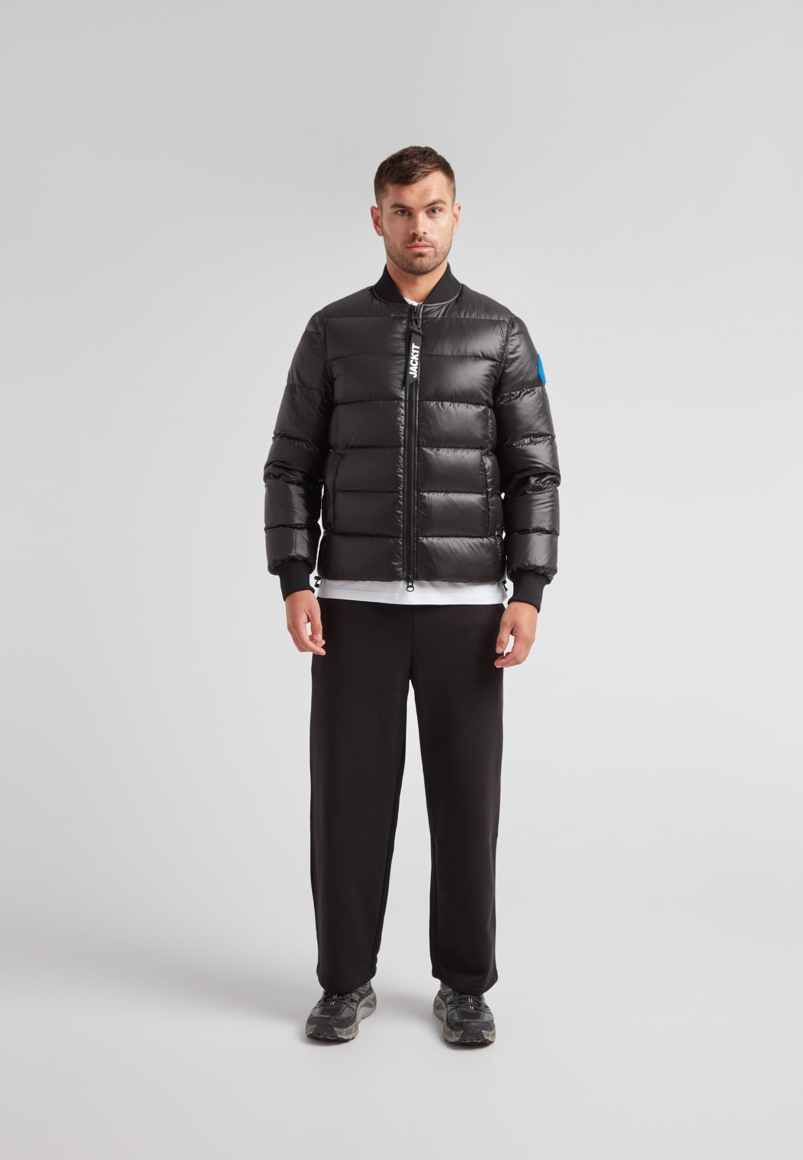 Vortex Black Bomber Jacket displayed on a model, featuring a durable nylon shell and modern design.