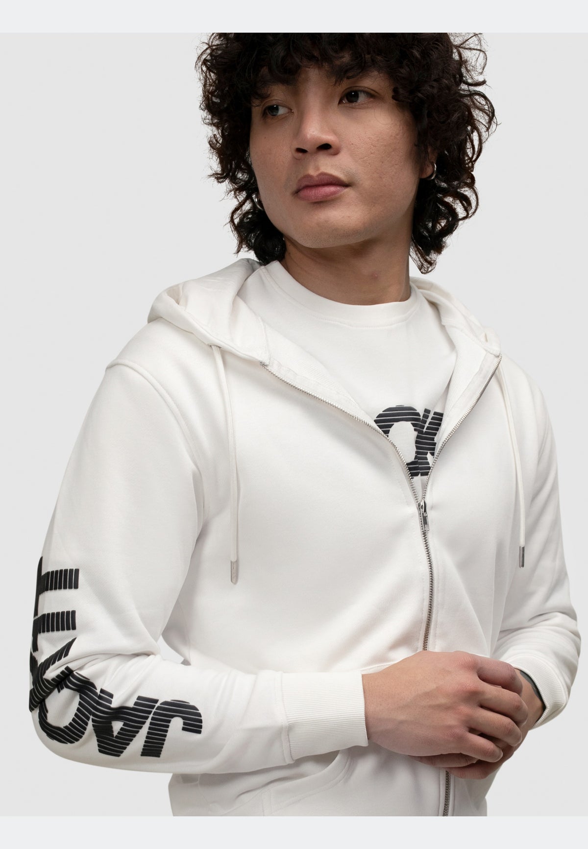 off white zip-through hoodie displayed on a model showcasing casual and stylish look.
