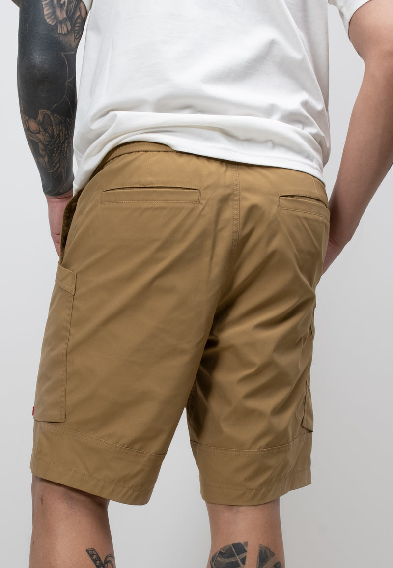 Men's sand summer shorts showcasing a relaxed fit and elasticated waist, ideal for warm weather.