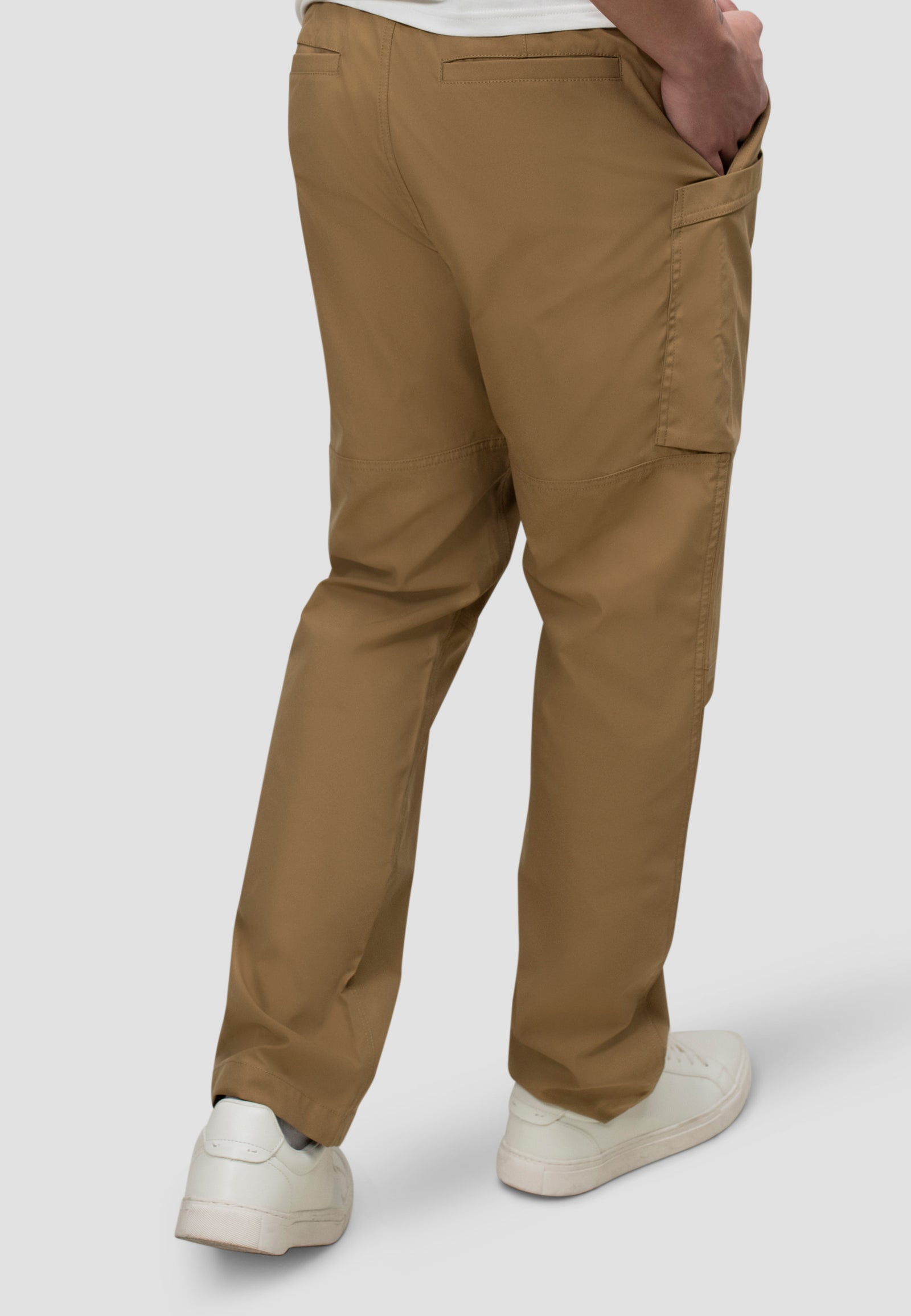 Men's sand cargo trousers featuring a relaxed fit, elasticated waist, and adjustable drawstrings, shown from the back.