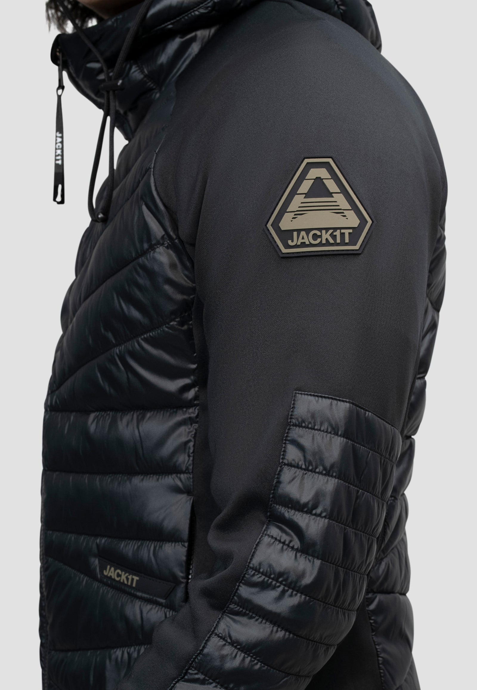 Men's black hooded jacket featuring THERMOLITE insulation and a sleek design for optimal movement.