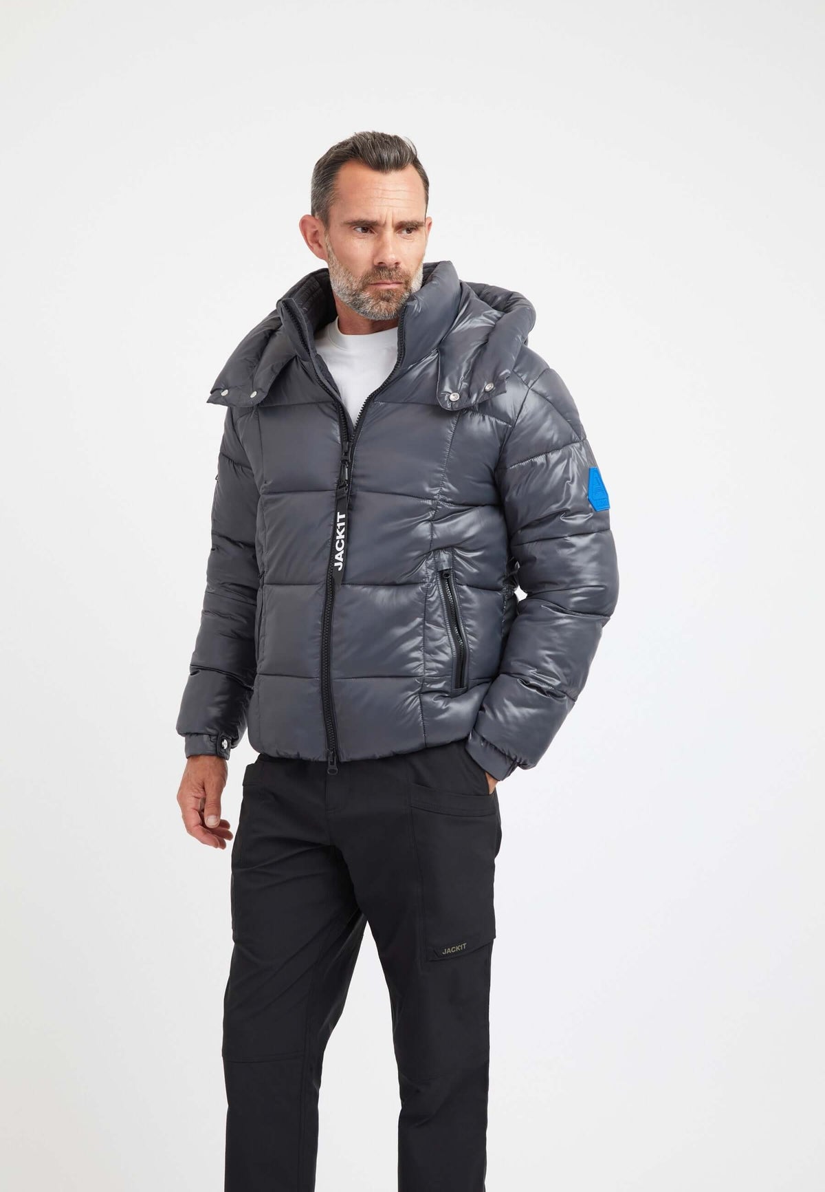 Mens grey racer jacket worn by a man, featuring premium synthetic insulation and a tapered fit, in graphite black color.