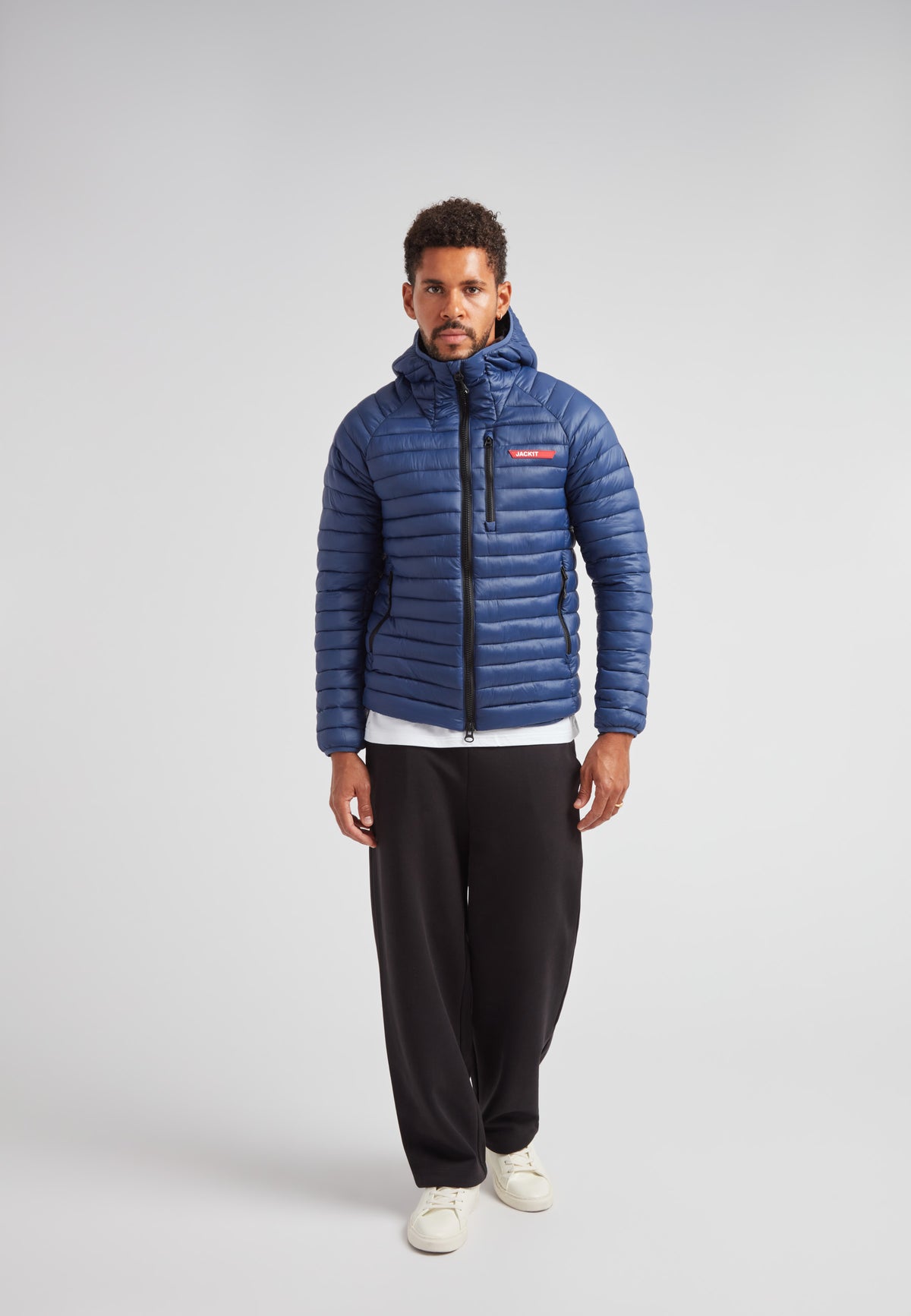 SATEL1TE hooded jacket 2.0 pacific blue worn by a model showcasing its stylish design and comfortable fit.