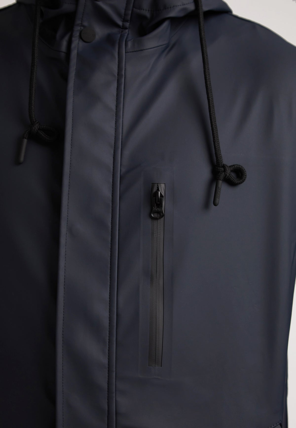 Close-up of the ELEMENTS Unisex Raincoat 2.0 Navy featuring a zippered pocket and adjustable hood.