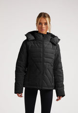 ISOTOPE Padded Jacket Black worn by a model, showcasing its windproof design and adjustable hood.