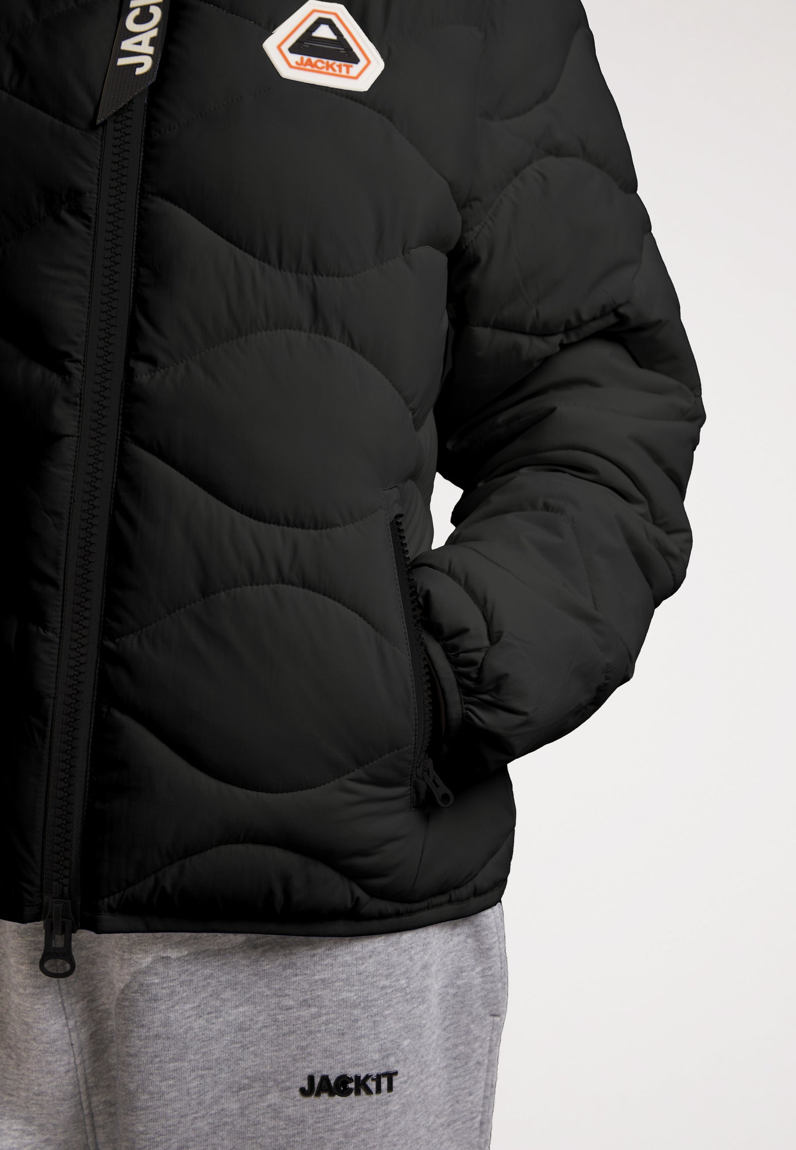 ORB1T Quilted Puffer Jacket featuring onion baffle design and soft touch fabric, perfect for warmth and style.