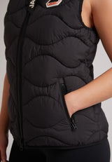 Close-up of the ORB1T Quilted Gilet Black showcasing onion baffle design and zippered pocket details.