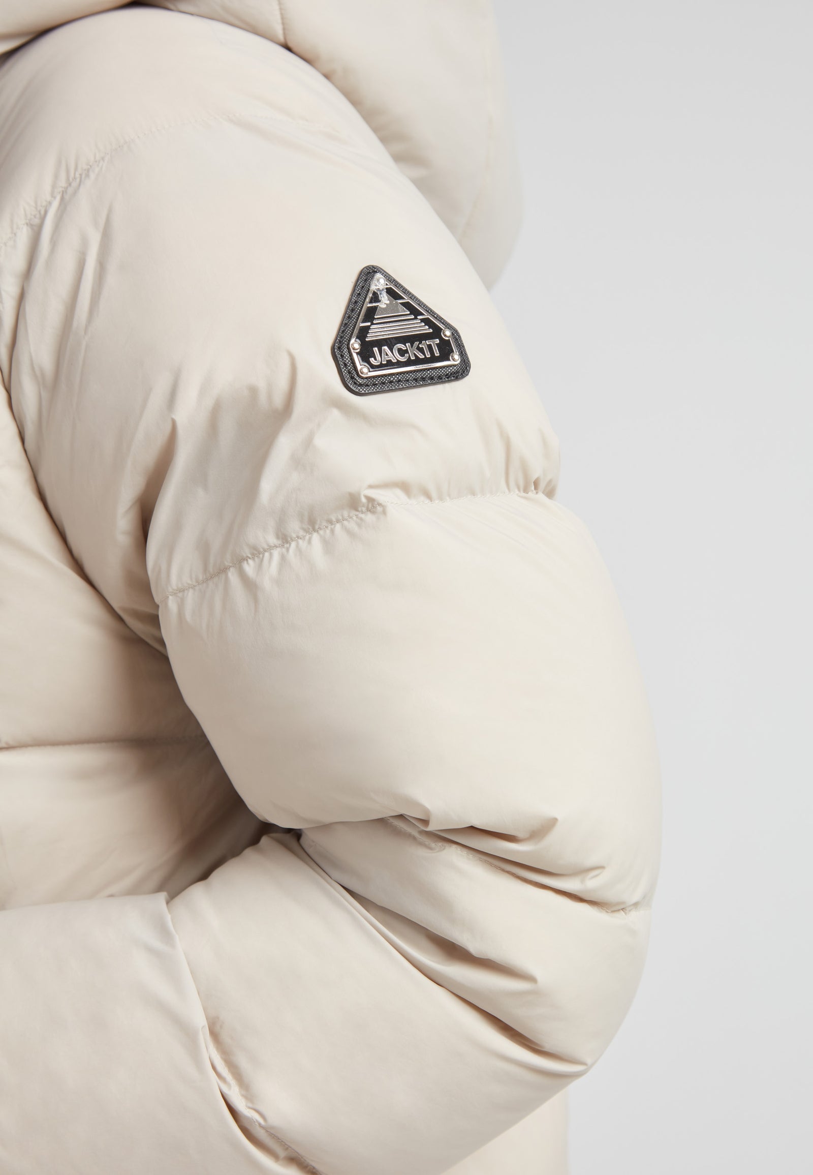 Cloud Prime Longline Down Puffer Jacket Stone sleeve detail with JACK1T logo