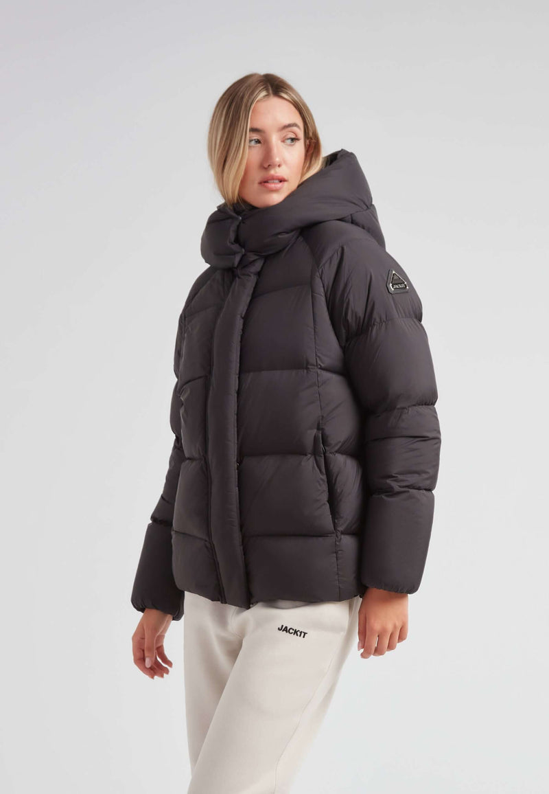 Model wearing the Cloud Prime Longline Down Puffer Jacket Black with adjustable hood