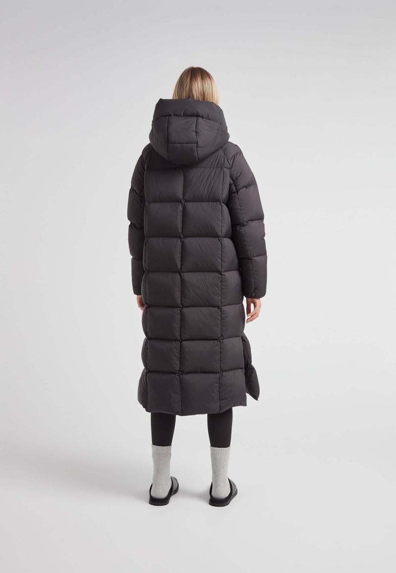 Back view of a woman wearing a Cloud Ultra Long Down Puffer Coat, showing the longest puffer jacket in black.