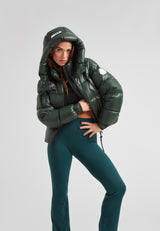 EZ Boxed Crop Down Puffer Jacket Lux Emerald worn by model in green puffer jacket with hood posing confidently.