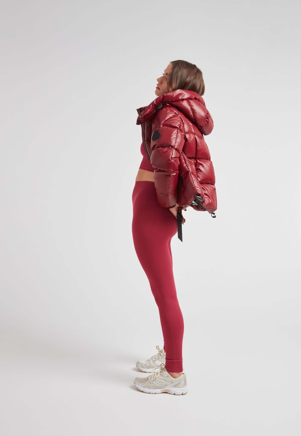 Model wearing EZ Boxed Crop Down Puffer Jacket in Lux Cranberry, showcasing short down puffer jacket women styling.