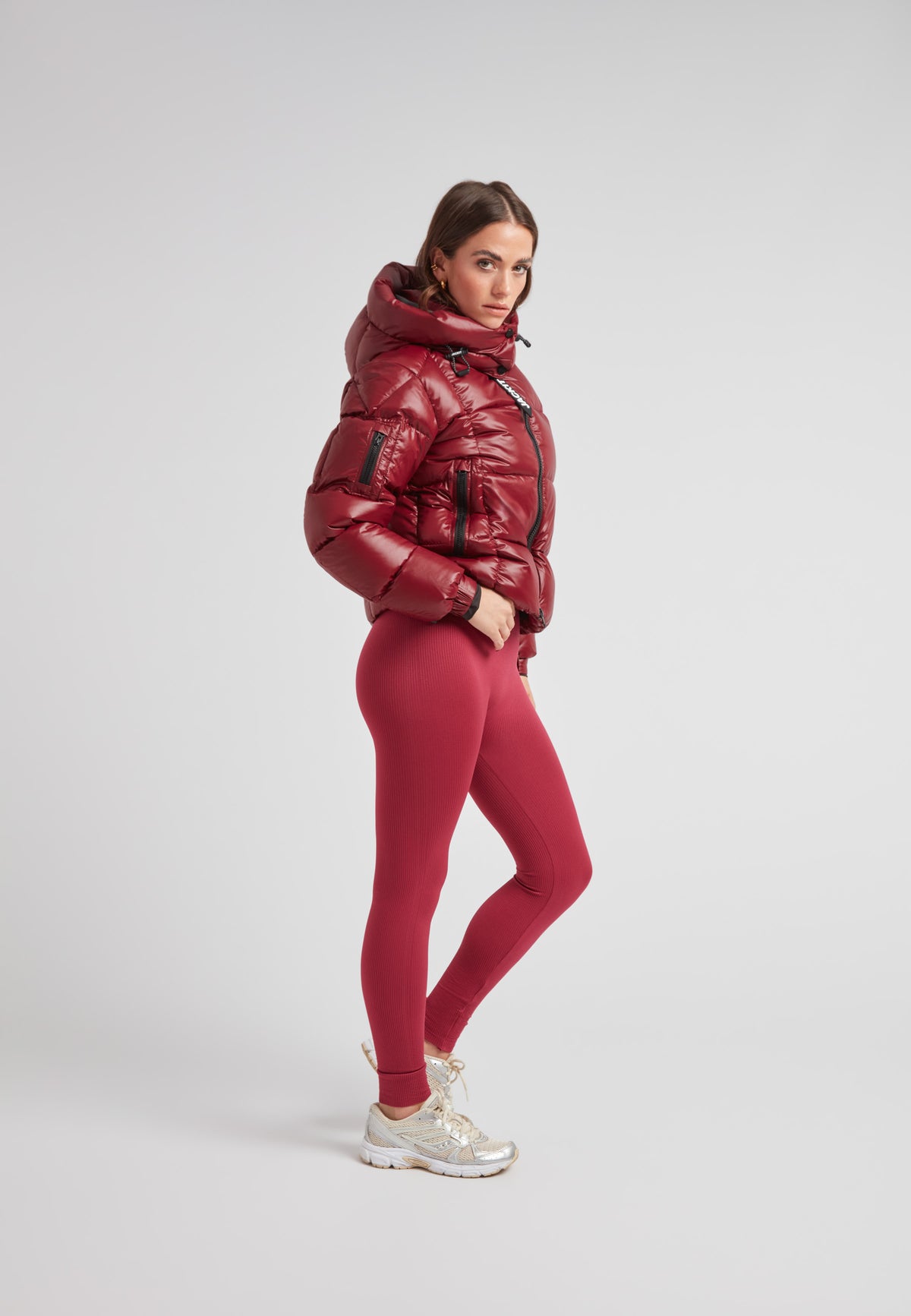 EZ Boxed Crop Down Puffer Jacket Lux Cranberry worn by model with matching leggings in a light studio setting.