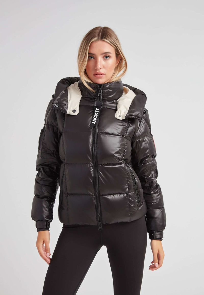 Model wearing the EZ Boxed Racer Down Puffer Jacket Lux Black, showcasing the stylish design and warmth for winter.