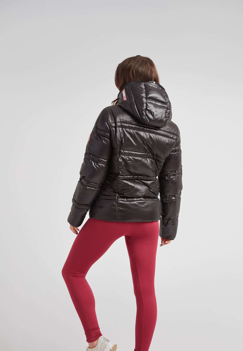 R4D Tramline Puffer Racer Jacket Lux Black displayed on model from the back, showcasing its sleek black design.