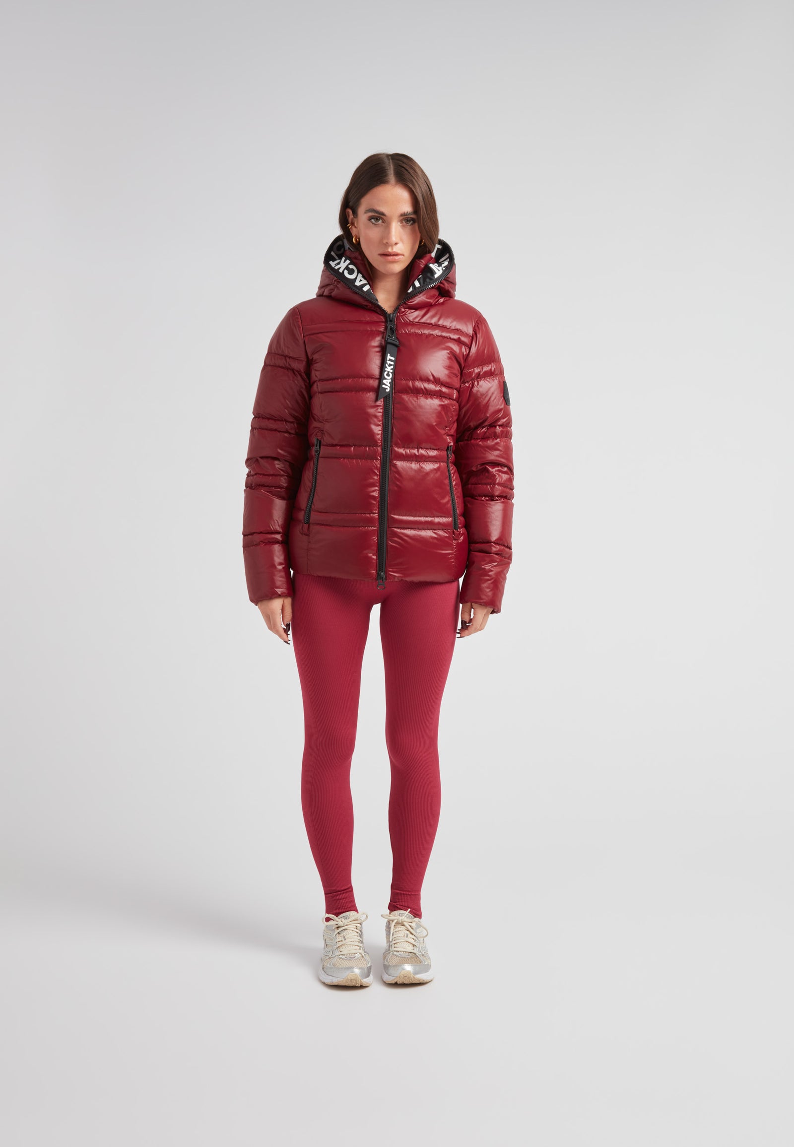 R4D Tramline Puffer Racer Jacket Lux Cranberry worn by a model, showcasing its stylish design and fit.