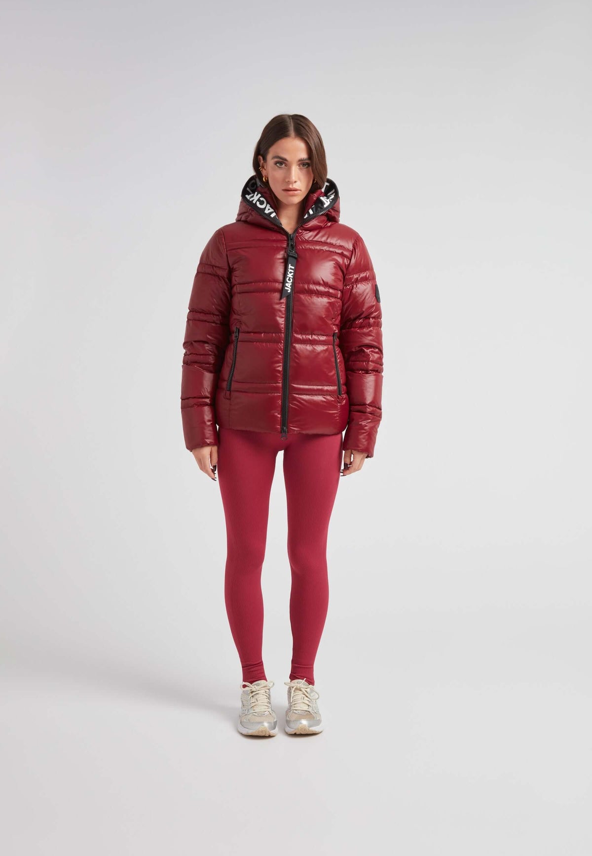 R4D Tramline Puffer Racer Jacket Lux Cranberry worn by a model, showcasing its stylish design and fit.