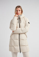 Model wearing the Black Star Puffer Down Coat Stone in a light color, showcasing its stylish design and functionality.