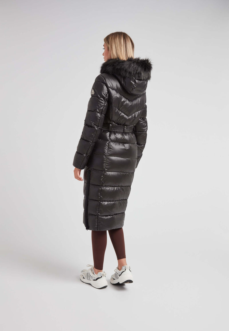Women's puffer coat with fur hood in black, showcasing a sleek design and full-length silhouette.