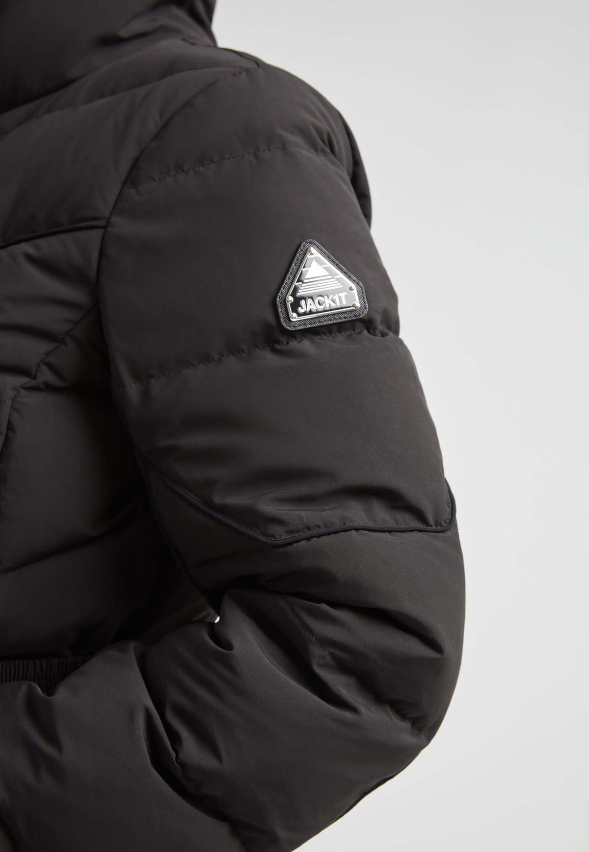 Diamond Belted Down Coat Matt Black close-up of sleeve and logo detail