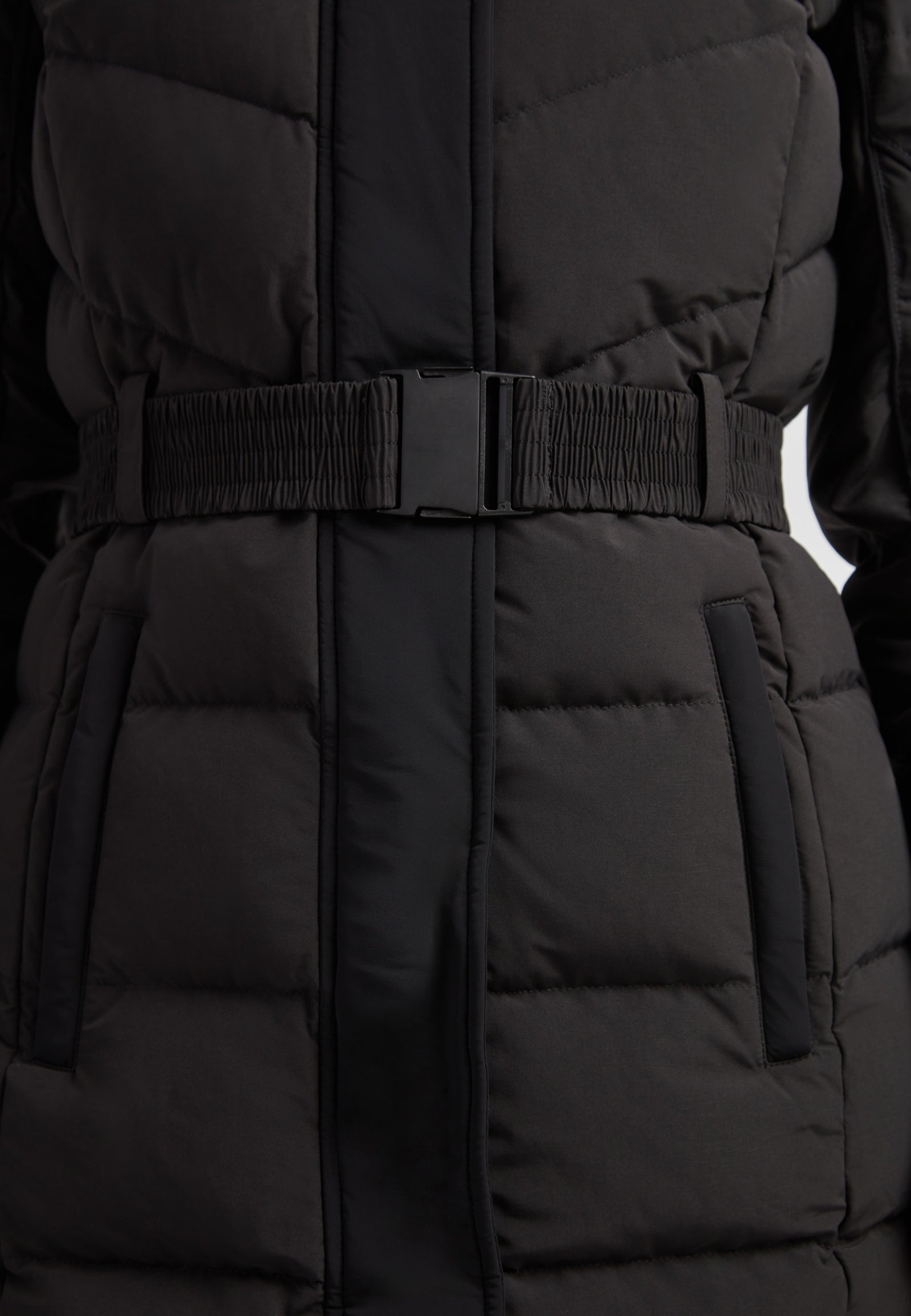 Diamond Belted Down Coat Matt Black featuring a belted waist and puffy texture for winter style and warmth.
