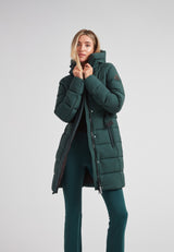 Woman wearing a Diamond Belted Down Coat Matt Emerald, showcasing its modern design and warm features.