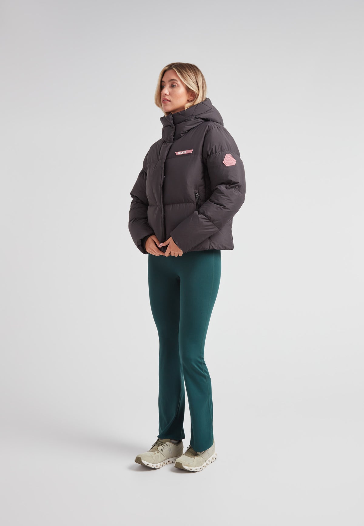 Model wearing the Star Shower Down Puffer Jacket Black, showcasing its stylish design and comfort.