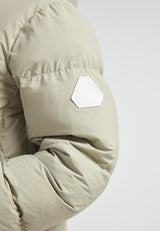 Close-up of the sleeve of the Star Shower Down Puffer Jacket Sage showcasing its stylish design and logo.