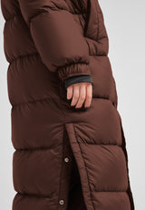 Cocoon Ultra Long Down Coat Mid Brown showcasing oversized silhouette and side-opening vents for comfort.