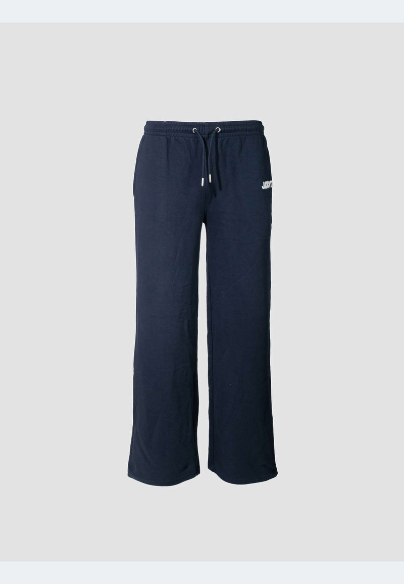 Navy joggers featuring a relaxed wide-leg silhouette and elasticated waistband for comfortable everyday wear.