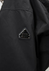 Detail view of Orpheus Cropped Jacket Black featuring branded patch, emphasizing the stylish design of ladies cropped black jacket.