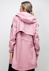 Womens Raincoat with Cape Dusty Pink showcasing back view with a lightweight design and hood.