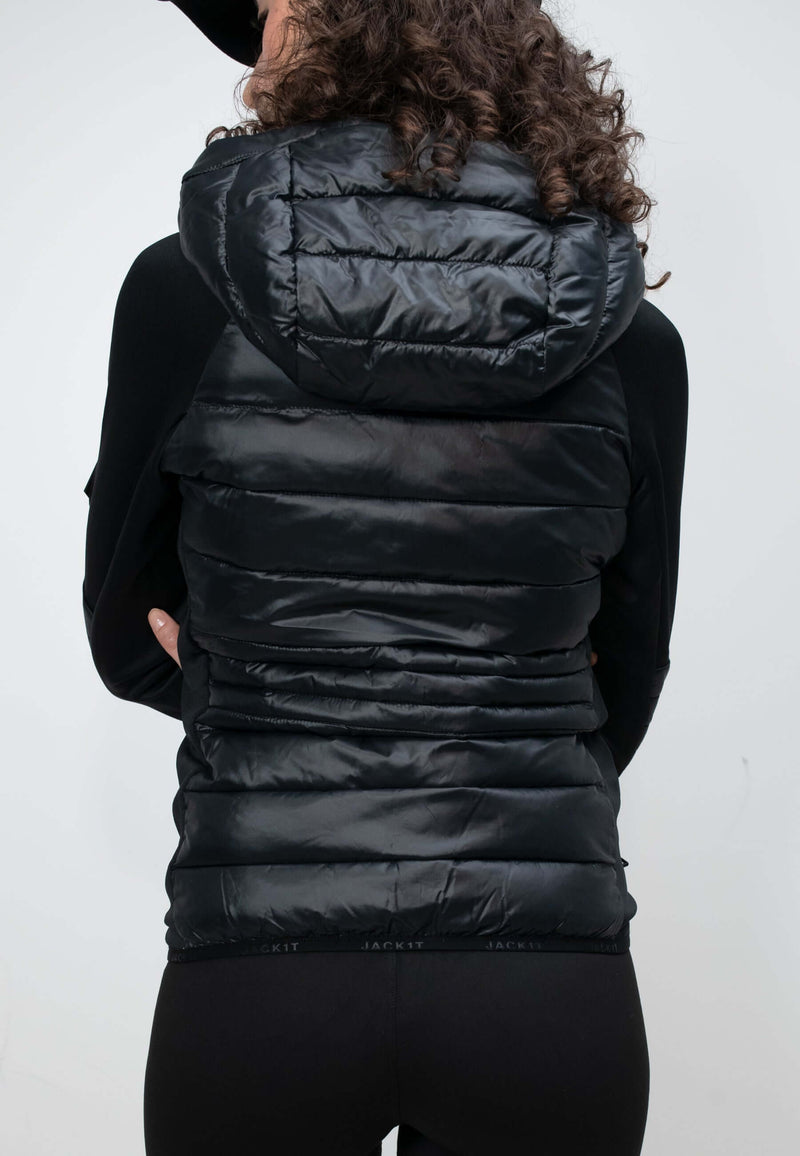 Women's black hooded jacket with a slim fit and lightweight design, perfect for spring and autumn wear.