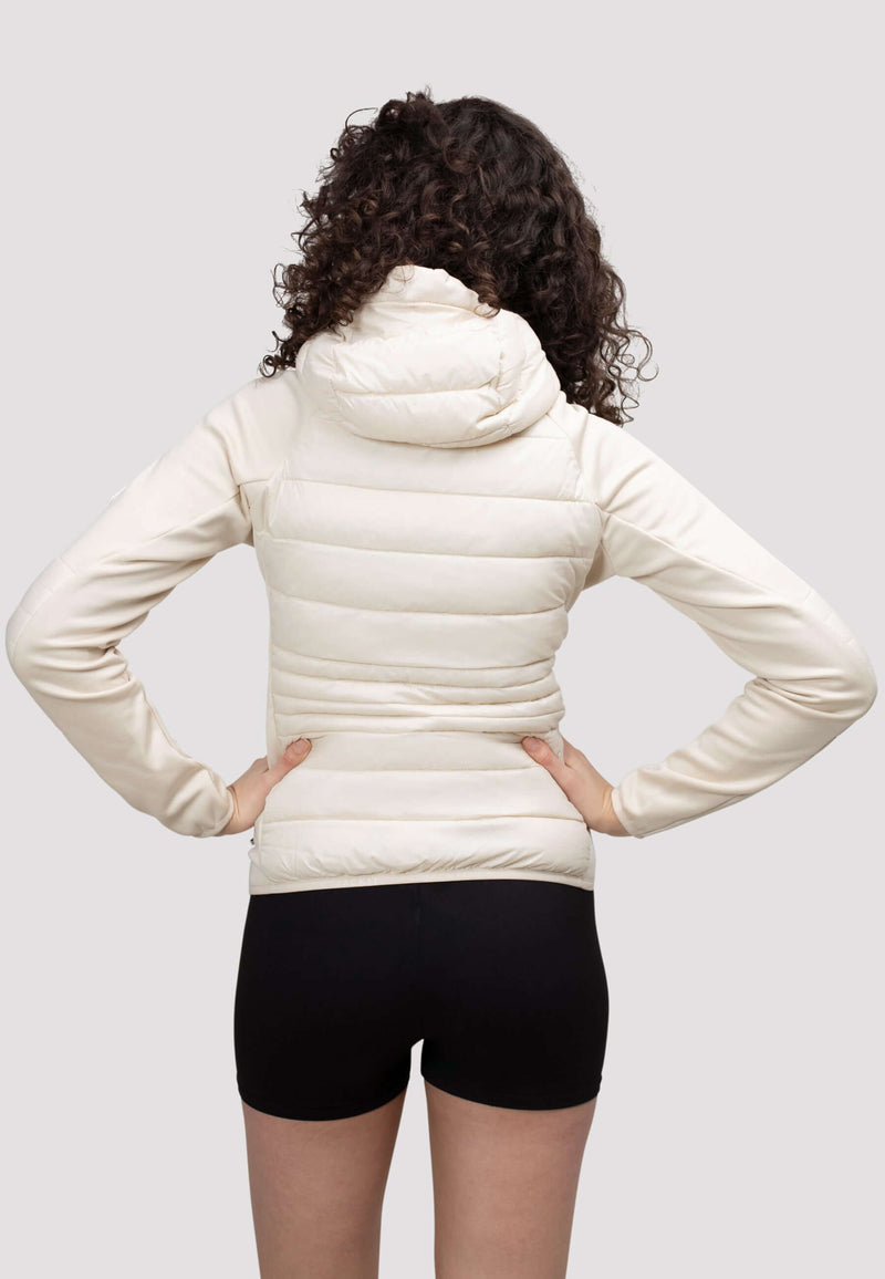 Back view of women's cream hooded jacket on model, showcasing lightweight design and fit.