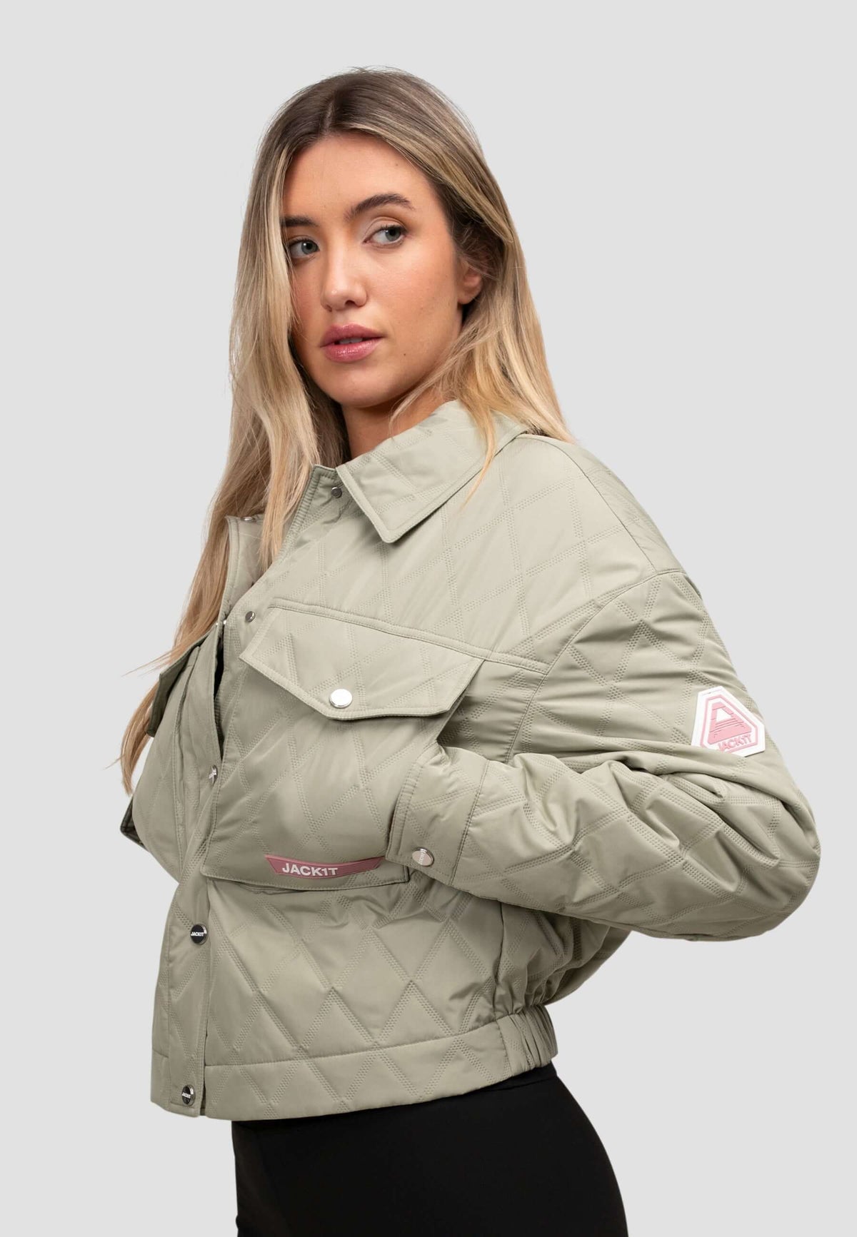 women's sage quilted shirt jacket worn by a model, showcasing a lightweight and stylish outer layer.