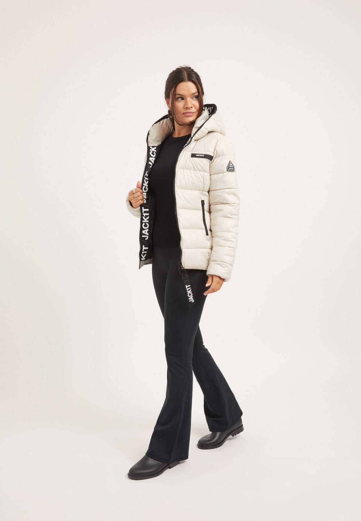 Model wearing R3D Slick Racer Jacket Stone with tapered racer fit, showcasing womens racer puffer style.