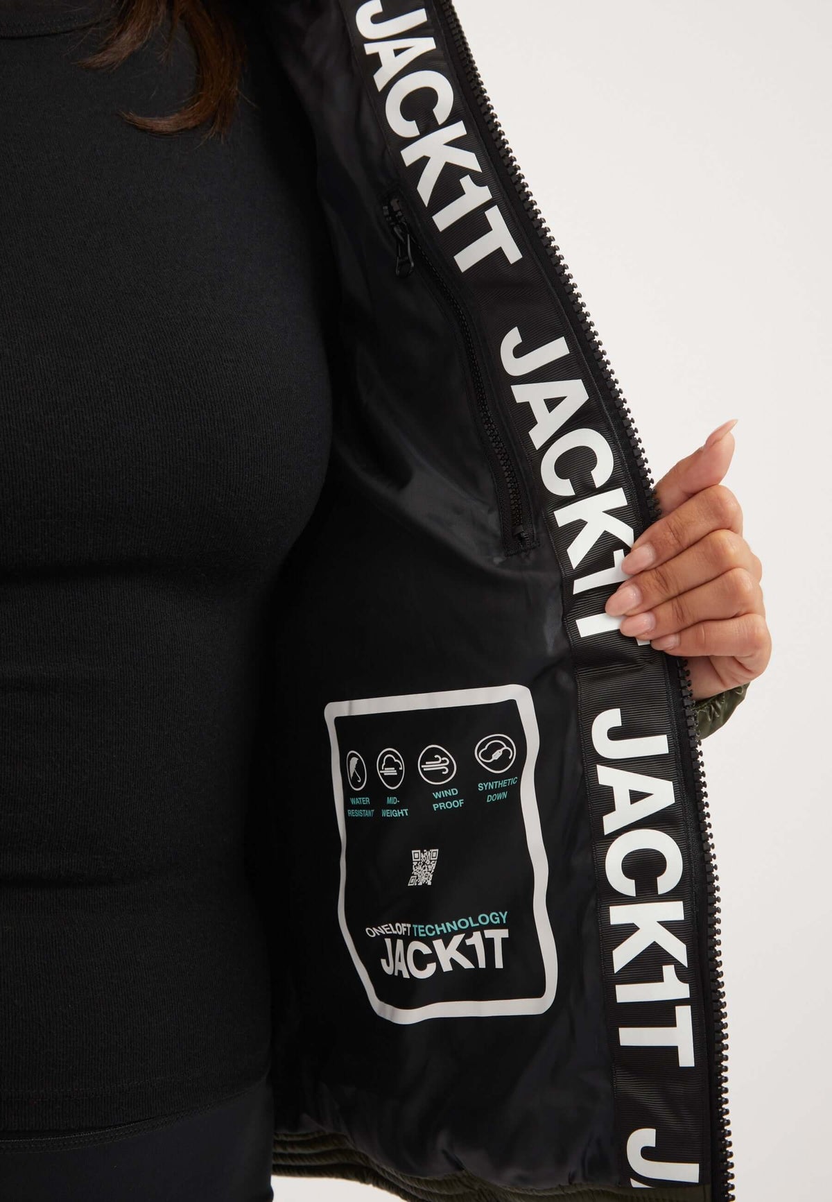Interior view of R3D Slick Racer Jacket Olive showing details and branding, featuring the fitted puffer jacket design.
