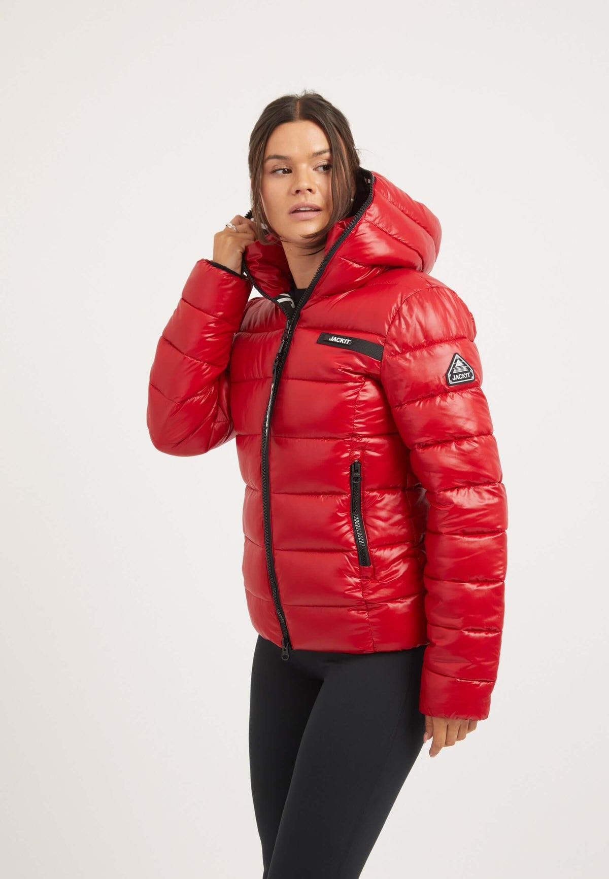 Short red jacket in cherry red with a hood and zip features, styled for a tapered racer fit.