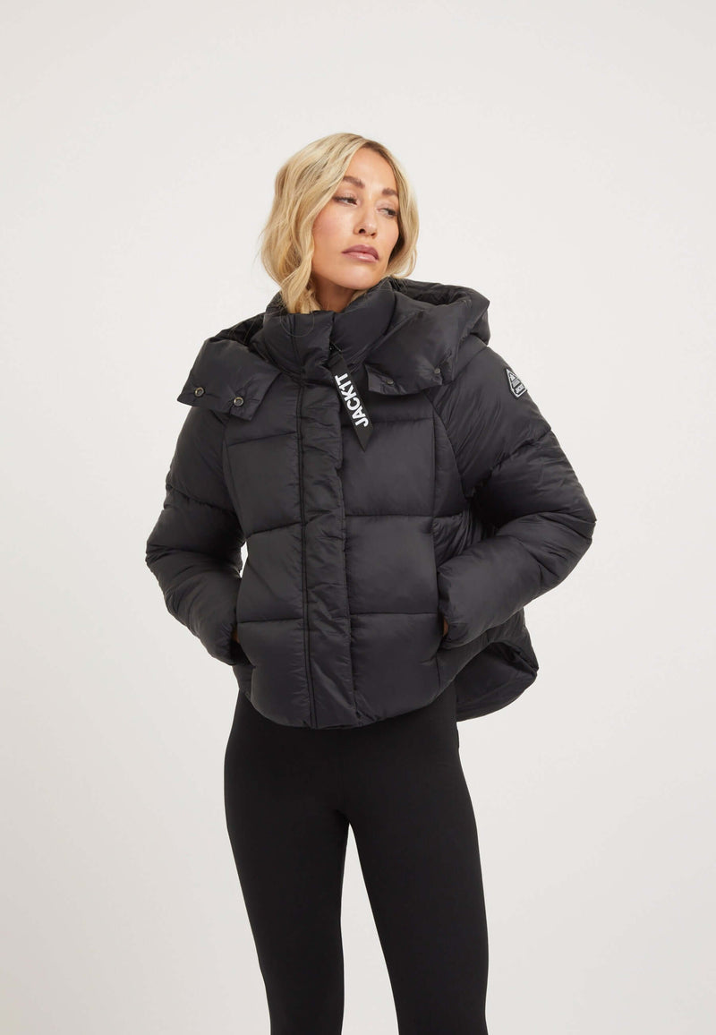Womens short puffer jacket in black, featuring a cropped cut and adjustable hood for modern style and weather protection.