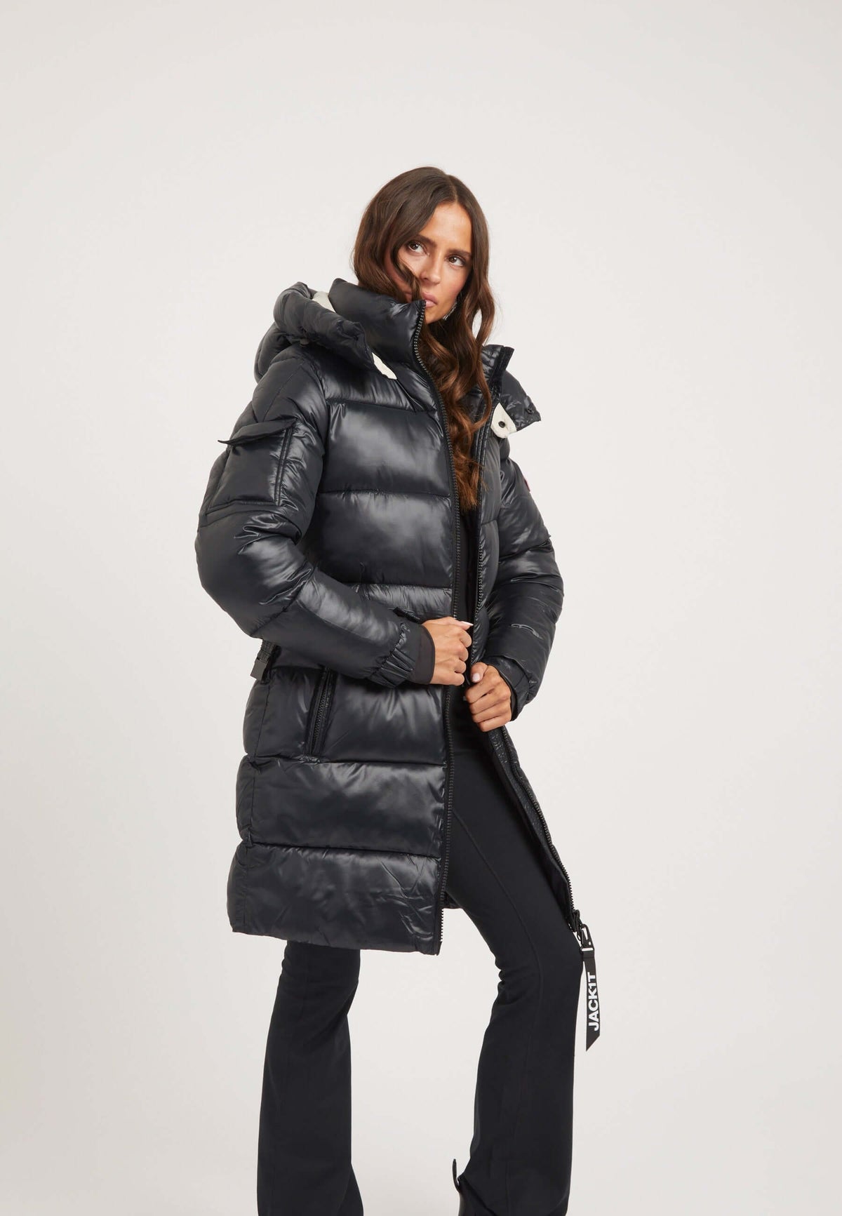 Womens belted coat black, featuring a tapered style, premium insulation, removable belt, and hood.