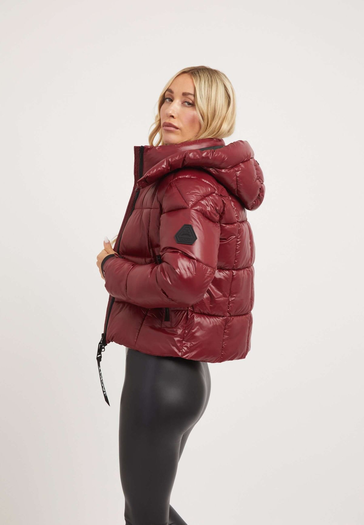 Model wearing dark cranberry EZ Box Crop Jacket, showcasing cropped fit and puffer design, perfect for short puffer jacket women.