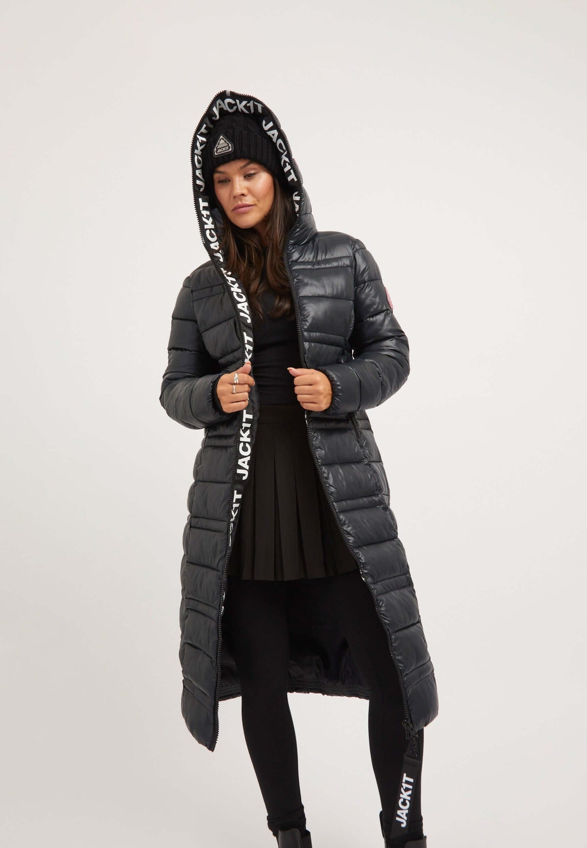 Model wearing R4D Extra Long Straight Baffle Coat Black, showcasing extra long puffer coat style and sleek design.