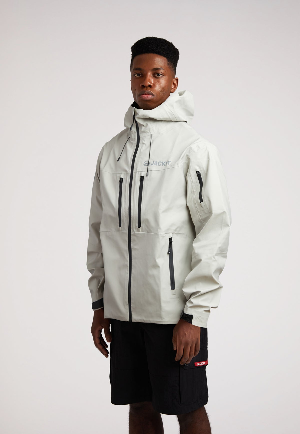 Stone mens lithium waterproof jacket worn by a model, showcasing its stylish design and functionality.